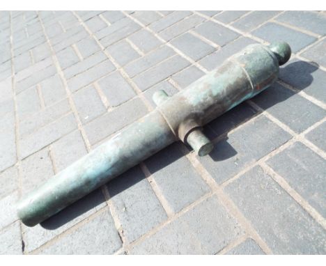 An ornamental cannon, overall length 80 cm x 26 cm, diameter of bore approx 5 cm,  length of the hoe down the barrel 52 cm, a