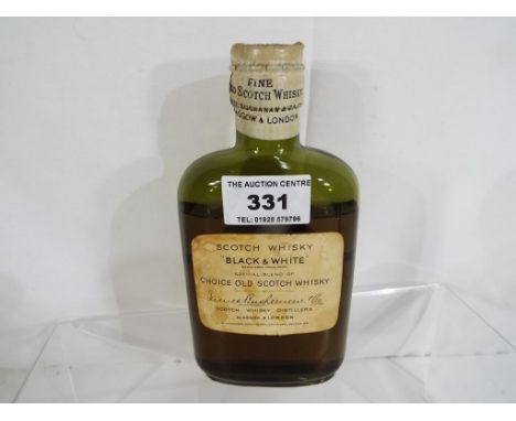 Black & White special blend of choice old Scotch Whisky, James Buchanan & Co, label adhered verso indicates 1939 bottling, gr