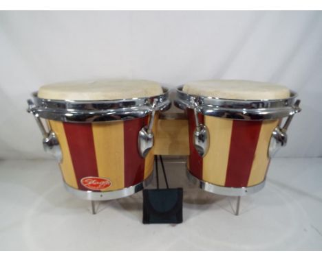 A pair of good quality bongo's by Stagg  This lot MUST be paid for and collected, or delivery arranged, no later than close o