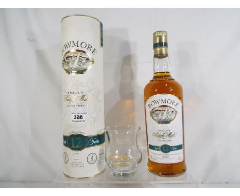 Bowmore Islay single malt Scotch whisky, aged 12 years, in tube with branded nosing glass, 70cl, 40% vol, level low neck, exc