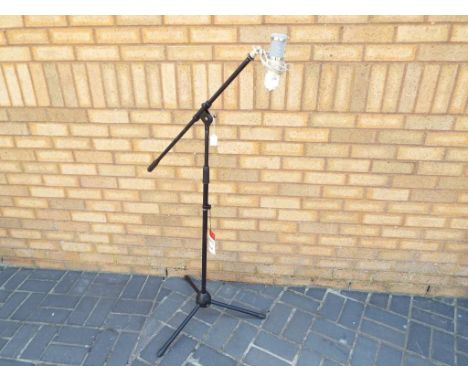 A good quality Stagg microphone stand with microphone  This lot MUST be paid for and collected, or delivery arranged, no late