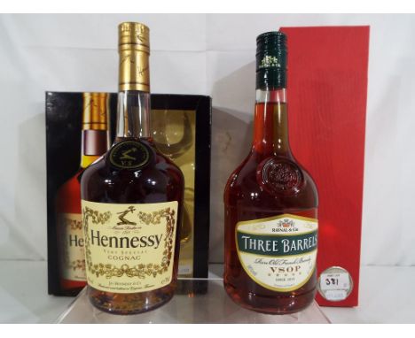 A bottle of Three Barrels Rare Old French Brandy VSOP, level high neck and a Hennessy Very Special Cognac gift set, level low