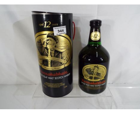 Bunnahabhain single Islay malt Scotch whisky aged 12 years, 1 litre, 40% vol, in tube, level low neck, exc  - Est £30 - £50