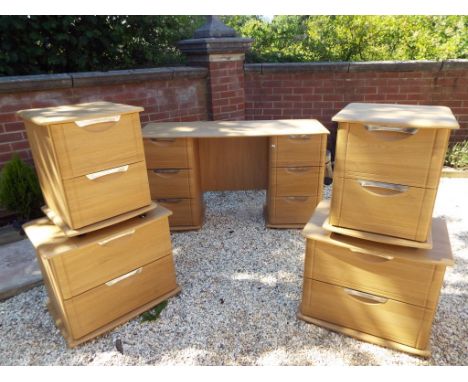 A modern light-wood, five-piece bedroom suite comprising two bedside cabinets 53 cm x 43 cm x 43 cm, two further twin-drawer 