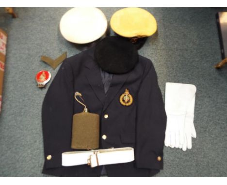 A blazer bearing a patch marked Royal Marine Commando, military caps, gloves, canteen and similar