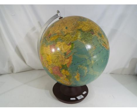 A vintage Rath political globe. Estimate £20 - £40  This lot MUST be paid for and collected, or delivery arranged, no later t