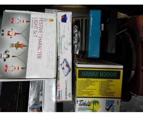 A mixed lot comprising two boxes containing a boxed telescope, camera tripod, 2in1 Rotary Trimmer, under cabinet light set, H