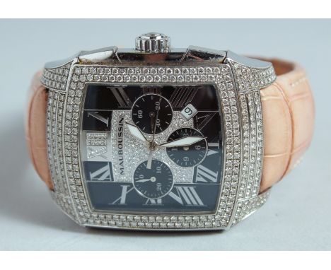 A MAUBOUSSIN DIAMOND SET WRISTWATCH with leather strap. No. 0264 R 529.