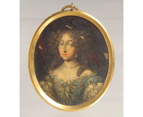 A LATE POSSIBLY 17TH CENTURY OVAL PORTRAIT MINIATURE OF MADAME de MONTPESIRE, oil on copper. 2.5ins x 2ins.