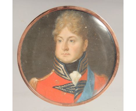 A CIRCULAR PORTRAIT OF A GENTLEMAN, probably WILLIAM IV, in a red coat. 2.24ins x 2.25ins.