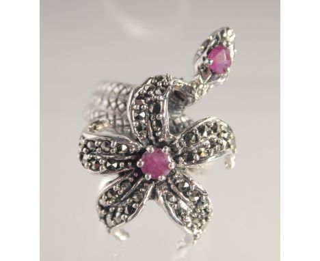 A SILVER AND MARCASITE RUBY SET SNAKE AND FLOWER RING.