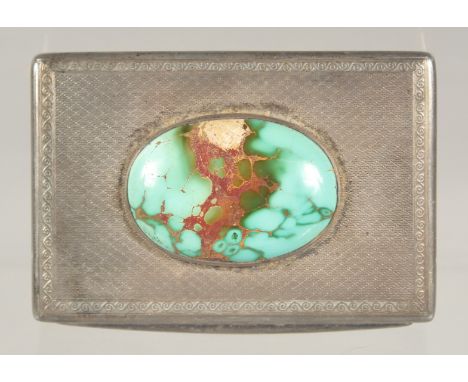 AN ENGINE TURNED SILVER SNUFF BOX with an inset stone top. (A/F) French, circa. 1900. 3.25ins x 2ins.