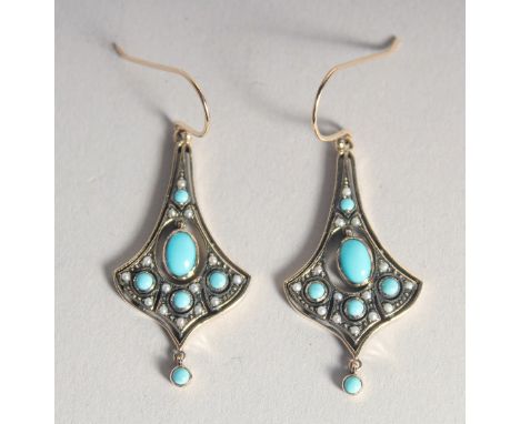 A PAIR OF 9CT GOLD TURQUOISE SET SEED PEARL EARRINGS.