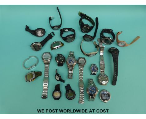 Over 20 various ladies and gentleman's wristwatches including Casio, Adidas etc.  