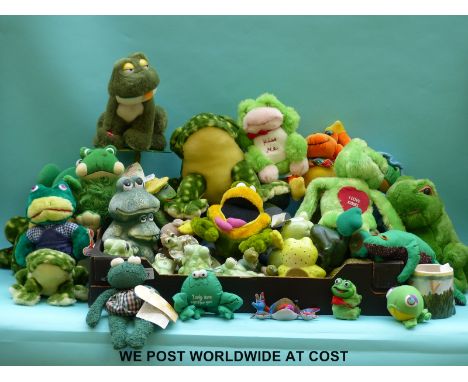 A collection of ceramic and soft toy frogs 