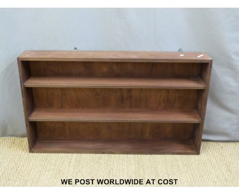 A mahogany wall shelf unit (W122 x D18 x H71cm)