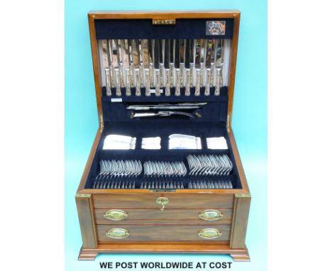 A Carrs of Sheffield 12 place setting King's pattern canteen of hallmarked silver cutlery in cabinet. Comprising dinner forks