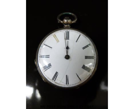 A gentleman's continental silver pocket watch of smaller proportions with keyless wind movement, black Roman numerals and han