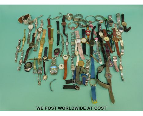 Over 50 various ladies and gentleman's wristwatches including Timex, Lorus, Barbie etc. 