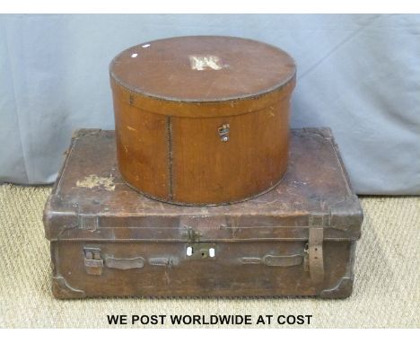 A vintage leather case/trunk with stencilled 'Burke Calcutta' (length 83cm) and a vintage hat box