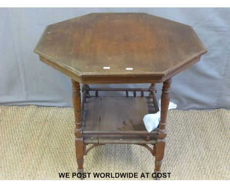 A late 19thC/early 20thC mahogany octagonal sidetable with galleried shelf below (width 77cm) 