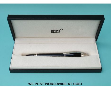 Montblanc fountain pen with black resin barrel and cap, chrome fittings and 18ct gold nib, in original box with service manua