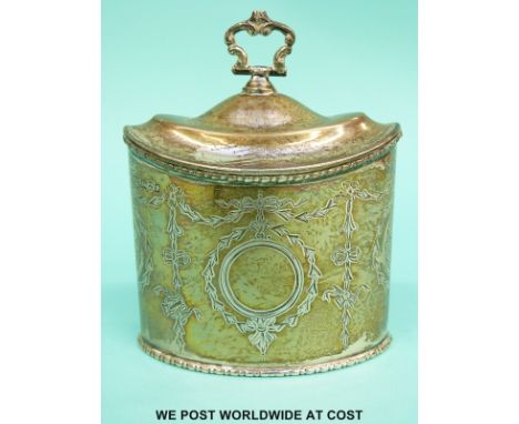 An Edward VII hallmarked silver tea caddy of Georgian design with neoclassical decoration and hinged lid, Sheffield 1909 make
