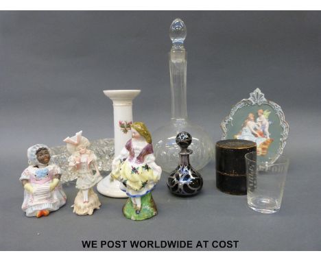 A cut glass decanter, a pair of glass salts, a cased medicine glass and a scent bottle with silver decoration together with a