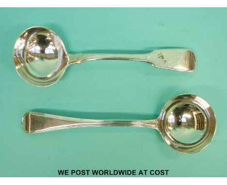A 19th century hallmarked sauce ladle, London 1824 and a further fiddle pattern example, London 1833, length of each approxim