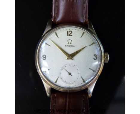 Omega 9ct gold gentleman's wristwatch with subsidiary seconds dial, gold hands and baton markers and engine turned face, on b