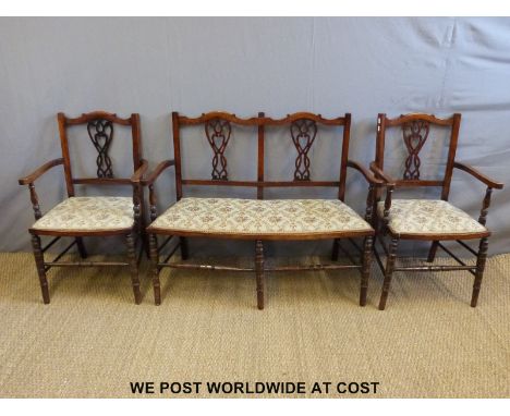A late 19thC salon suite comprising a sofa and two chairs (sofa length 112cm)