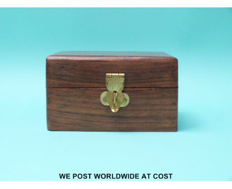 A cased brass Stanley compass with natural sine table to top