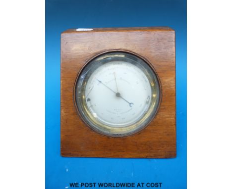 A 19thC brass travelling barometer by E J Dent, Paris, the silvered dial with spear styled hands and half moon below, mounted