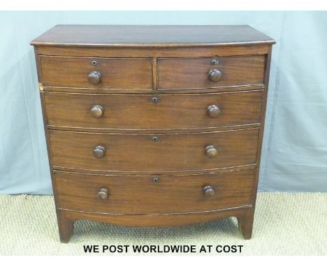 A 19thC mahogany bow-fronted chest of two over three graduated drawers raised on splayed bracket feet (H104 x W100cm x D52cm)