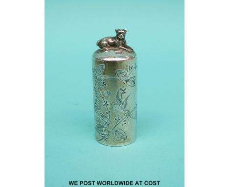 A Victorian hallmarked silver scent bottle with engraved floral decoration and seated dog finial, Birmingham 1884 maker Robin