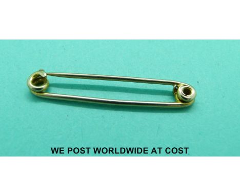 A 9ct gold hunting pin (1.8g)