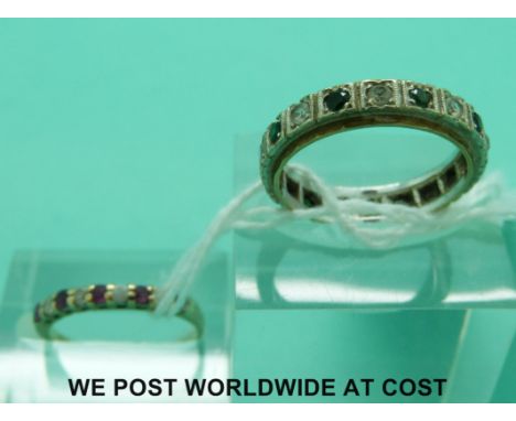 A 9ct gold ring and a white metal eternity ring (size M)