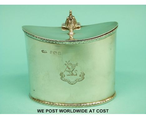 A George V hallmarked silver tea caddy of Georgian design with acanthus leaf finial, Birmingham 1911 maker James Woods & Sons