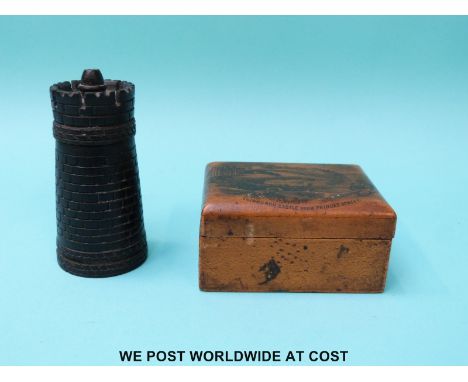 A carved treen snuff box/needle case in the form of a keep or rook chess piece and a Mauchline ware box, Edinburgh Castle fro
