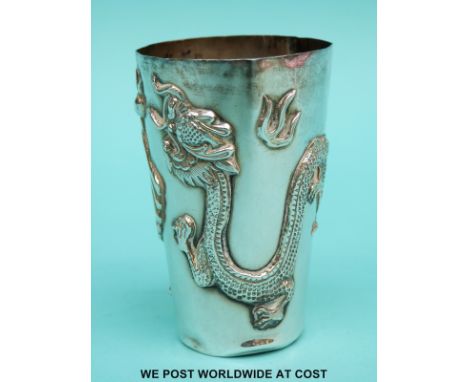 Chinese white metal beaker decorated with a dragon, seal mark to base, height 7.5cm weight 45g