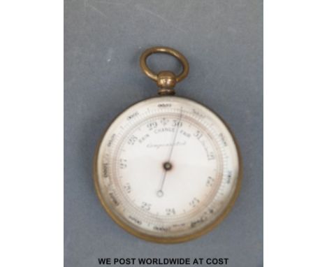 A 19th/20th century compensated pocket barometer in brass case; approximately 50mm diameter