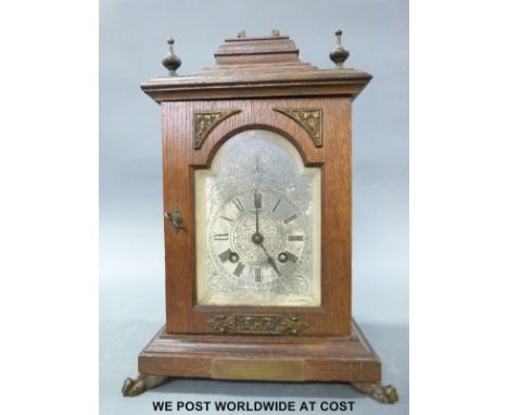 An oak-cased bracket style clock of small proportion, the Lenzkirch movement no 562708 striking on a bell, Mann of Gloucester