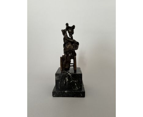 Salvador DALI (1904-1989).D'Après.&nbsp; « Don Quichotte assis ». 1972. Bronze et marbre noir. Signé « Dali ». Dimensions : 2