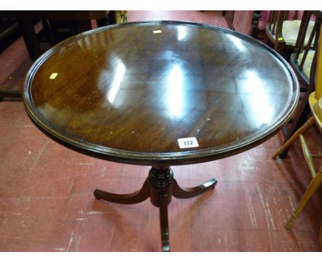 Well polished antique mahogany tilt top tripod table with circular tray top