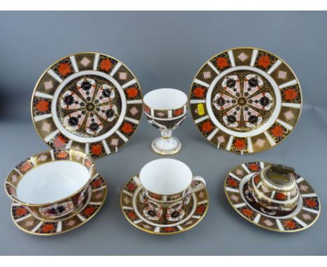 Nine pieces of Royal Crown Derby 1128 pattern china including a table lighter