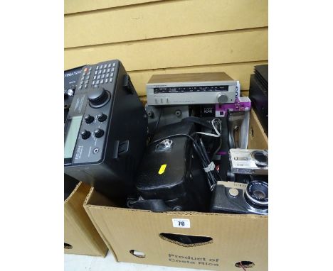 Box of Realistic DX-394 communications receiver, Realistic TM-150 AM/FM stereo tuner, audio generator model TE-22, small Olym