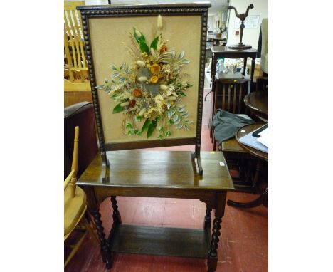 Oak barley twist two tier side table and a floral decorated firescreen