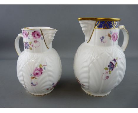 Two Coalport porcelain Caughley mask head jugs
