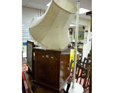 Vintage mahogany bedside cabinet on ball and claw supports and a white painted standard lamp with shade