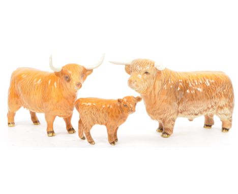 A set of three vintage 20th century Beswick ceramic Hereford cows, bull, cow and calf models. Largest measures 20cm (length).